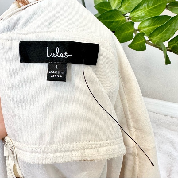 Lulus Flirty Ways Cream Floral Print Flutter Sleeve Romper - Picture 10 of 12